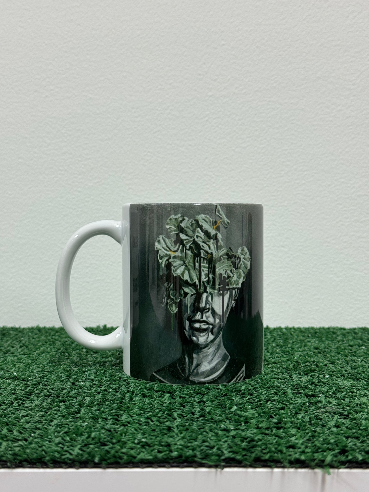 flowers + faces x the g0th garden black mamba begonia coffee mug