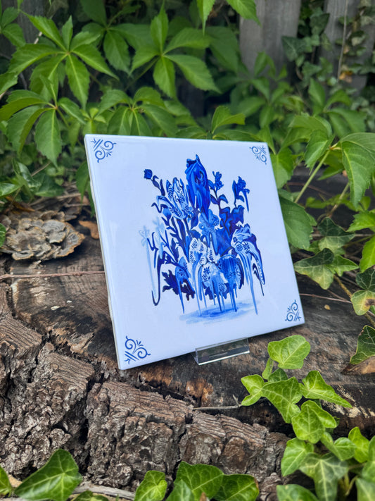 flowers + faces drippy blue tile #1