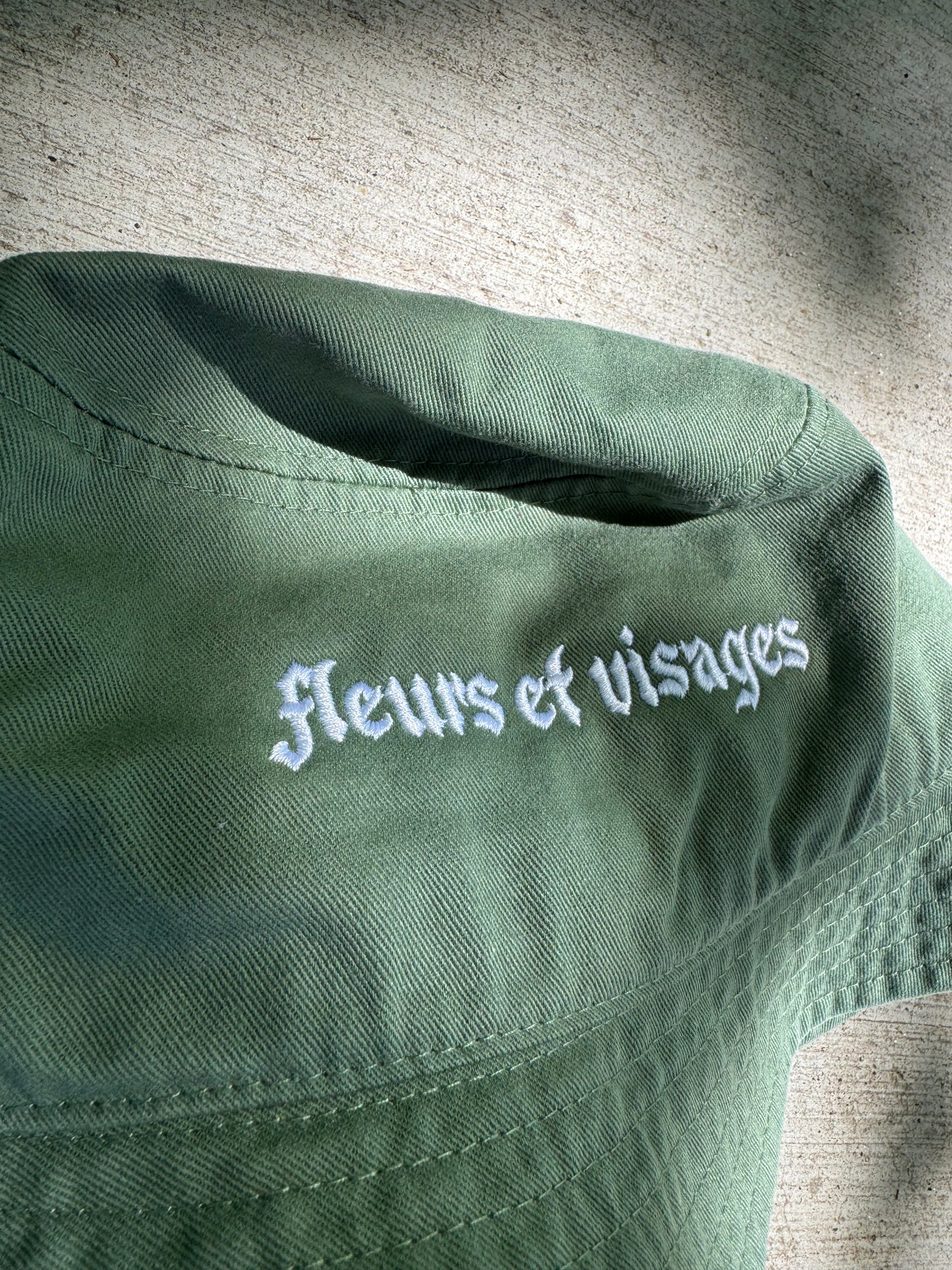 flowers + faces font bucket hat