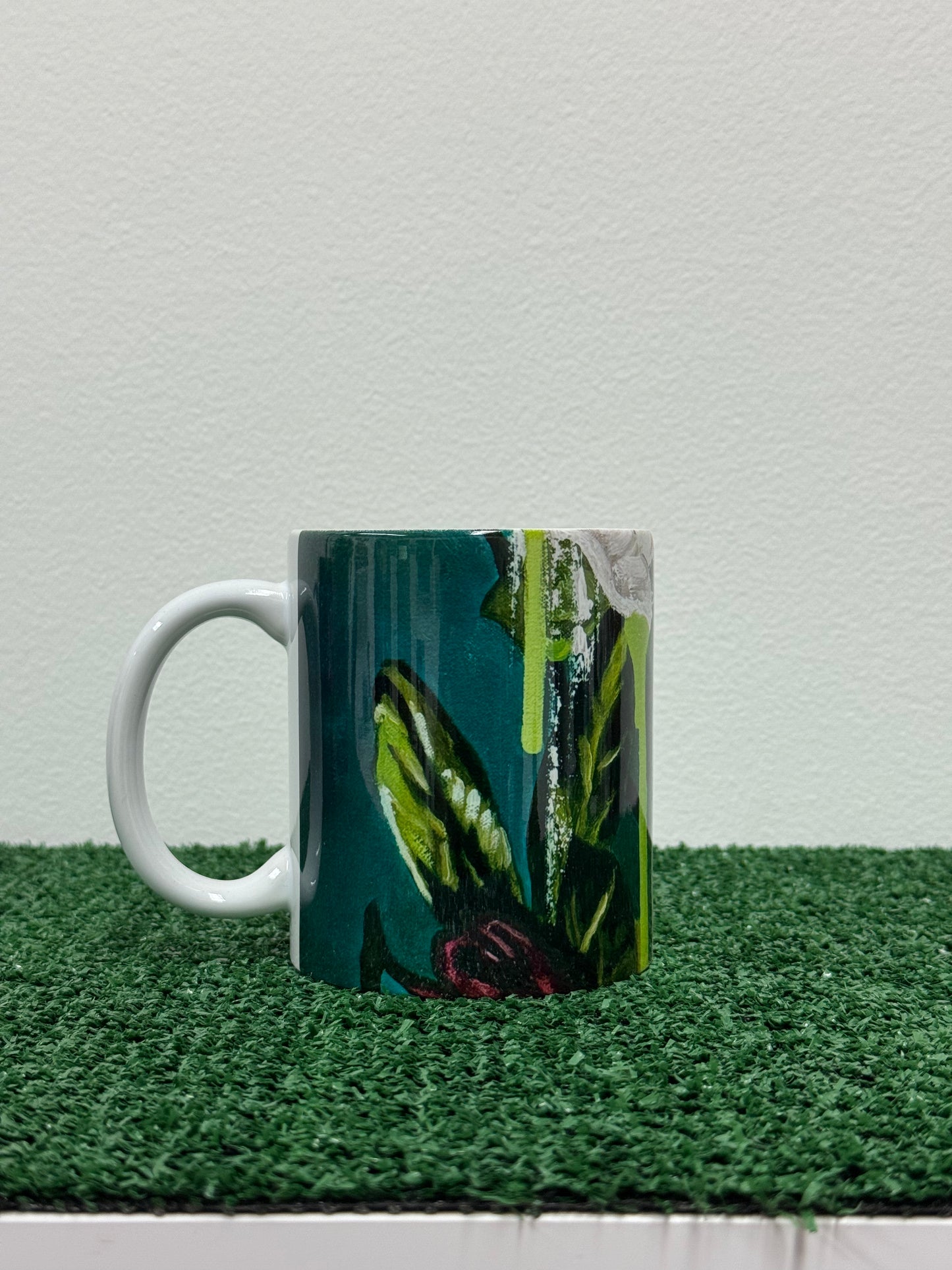 flowers + faces green + purps coffee mug